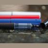 Plastic rollerball pen with ink