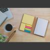 Notebook with pen and sticky notes