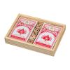 Playing cards in wooden box with dice