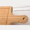 Bamboo chopping board with knife
